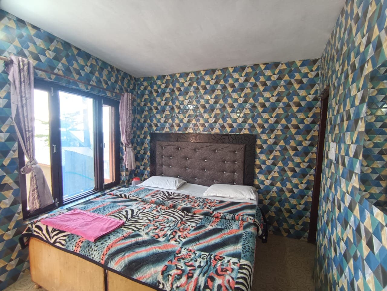 Double bed room at Karan Resort